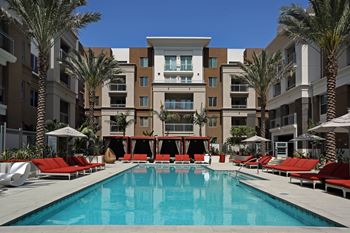 Three pools with cabanas and tv's
